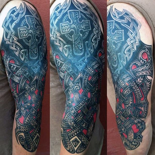 Detailed Celtic sleeve tattoo featuring intricate knot patterns and a large cross design