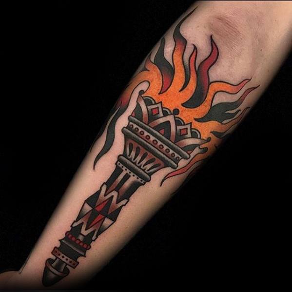 Neo-traditional torch tattoo with orange and red flames, bold black outlines, and geometric patterns on the handle.