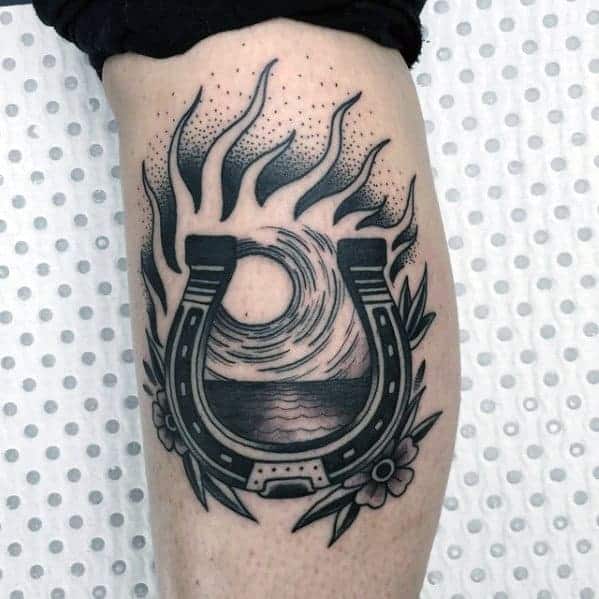 masculine-traditional-horseshoe-sun-ray-portal-mens-leg-tattoo
