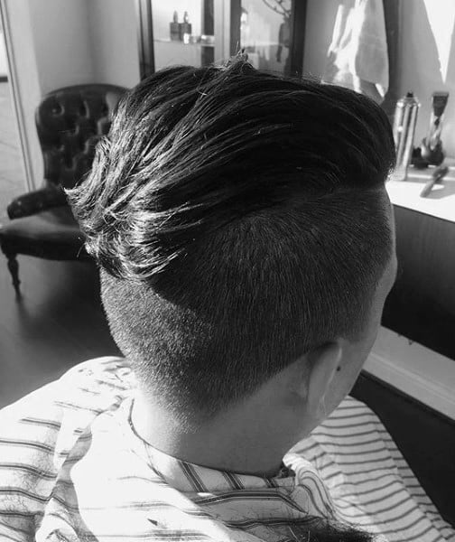 Masculine Undercut Slicked Back Style For Men With Thick Hair