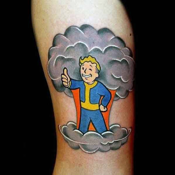 Vault Boy tattoo standing proudly in a gray mushroom cloud with orange glow, giving a thumbs-up in bold Fallout style.