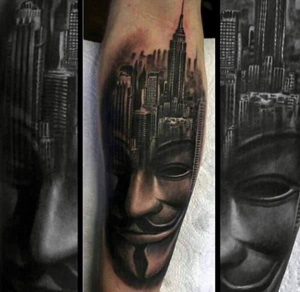 Mask With City Skyline Guys Inner Forearm Tattoo