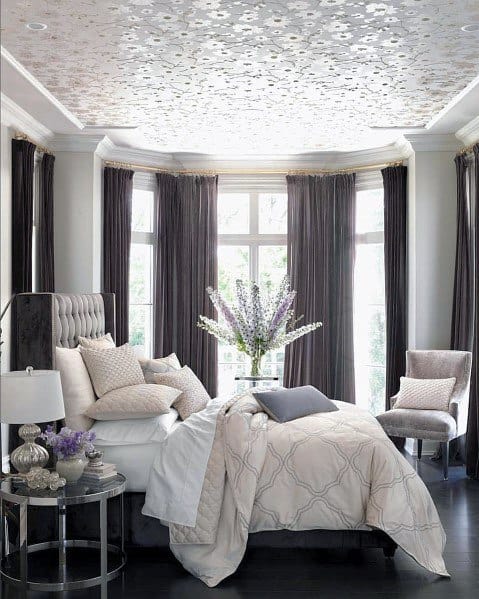 light and cozy romantic bedroom with textured ceiling 