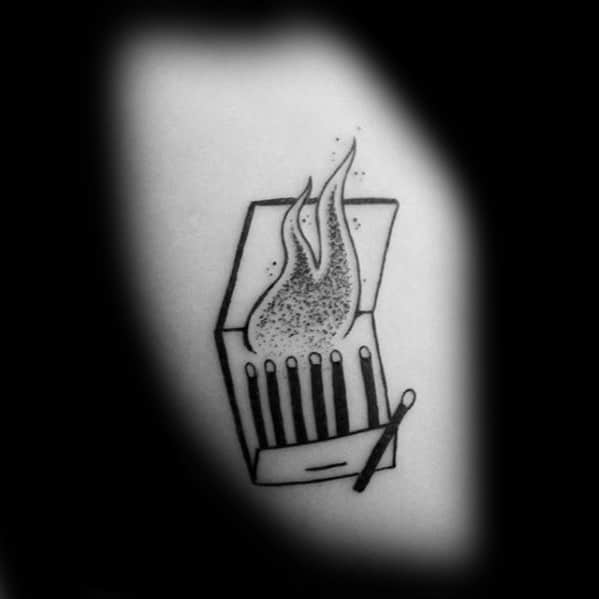 Minimalist blackwork tattoo of a matchbook with rising flames, symbolizing risk, rebellion, or igniting change from something small.