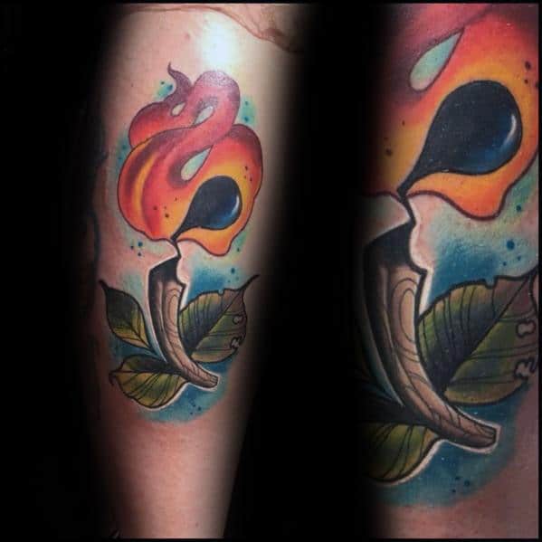 Colorful neo-traditional tattoo of a burning matchstick with bold flames, leaves, and vibrant background, symbolizing passion, nature, and renewal.