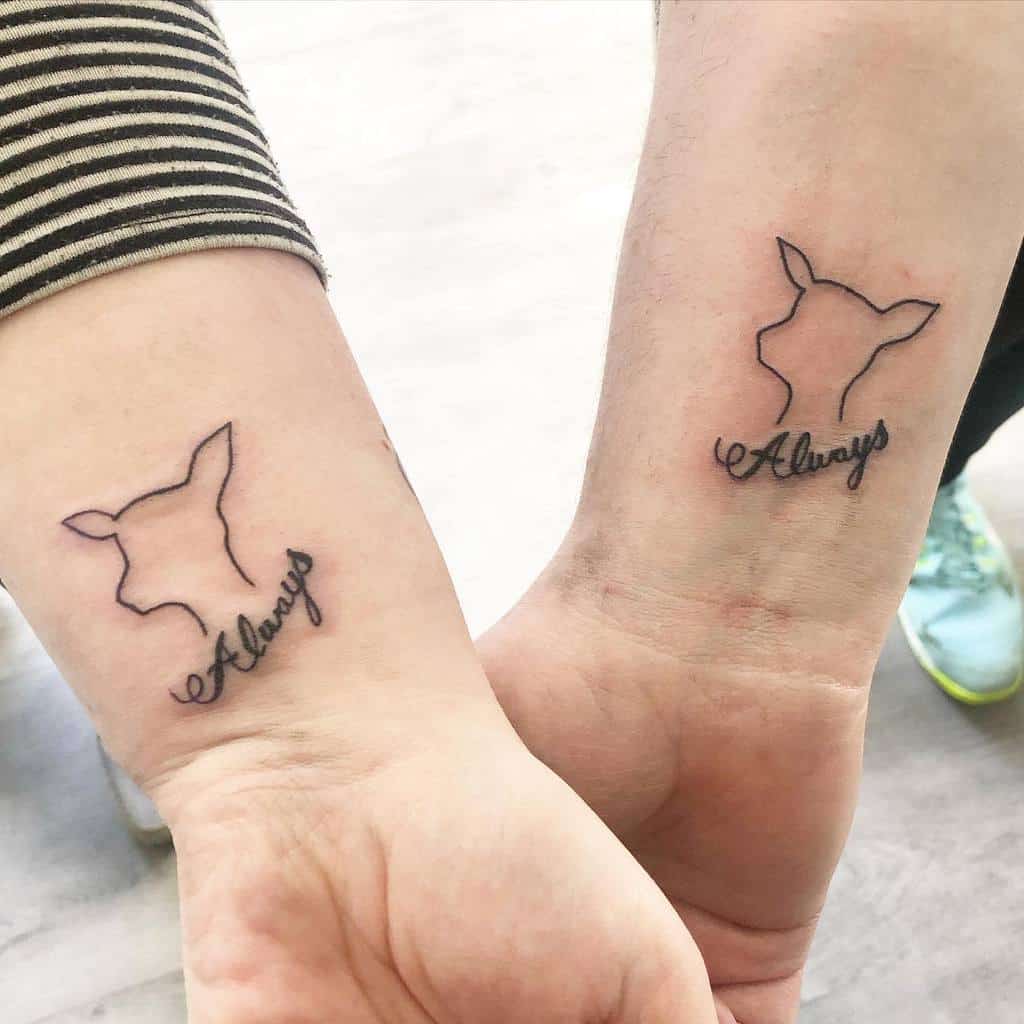 Matching minimalist deer outline tattoos with 'Always' in cursive script on wrists, symbolizing eternal love and connection