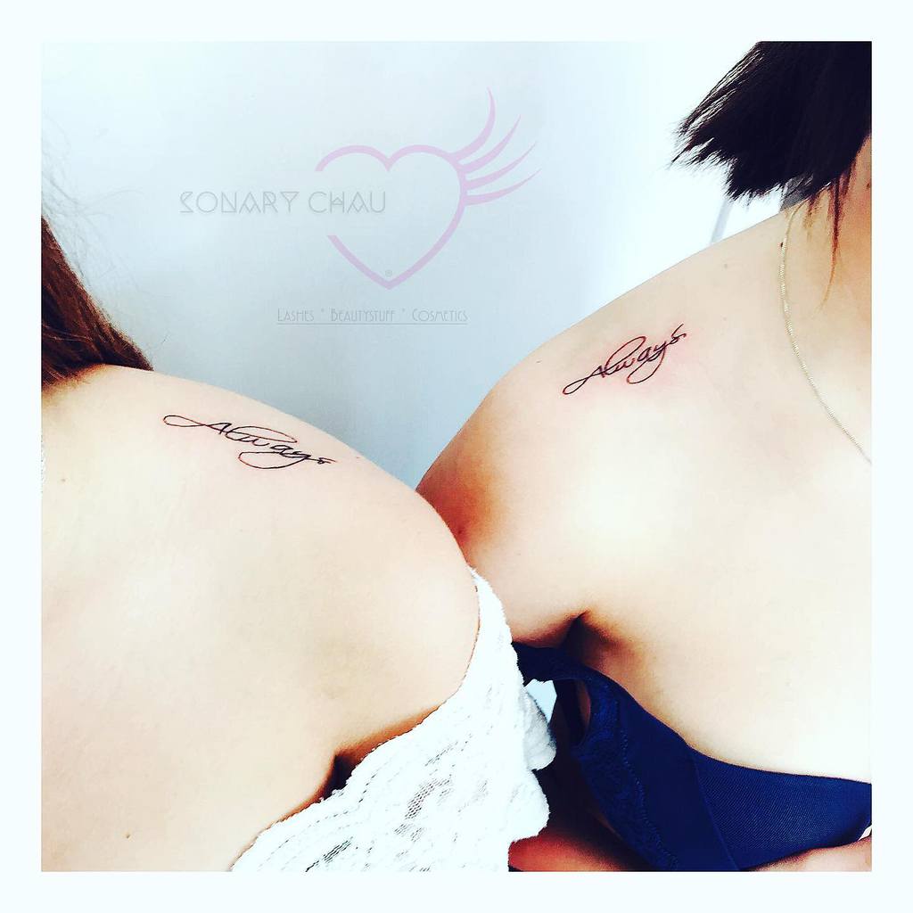 Elegant matching shoulder tattoos with 'Always' in cursive script, symbolizing an everlasting connection and love