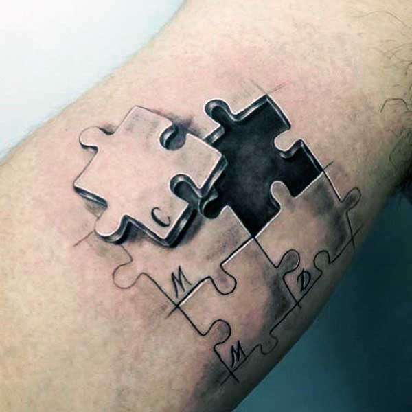 Matching Puzzle Piece Tattoos For Men On Bicep