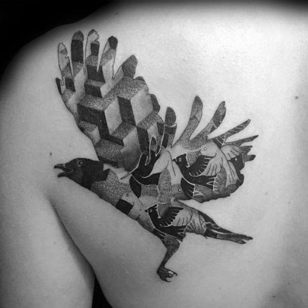 MC Escher-inspired tattoo of a crow with wings morphing into interlocking cubes and tessellated birds in a surreal geometric design.