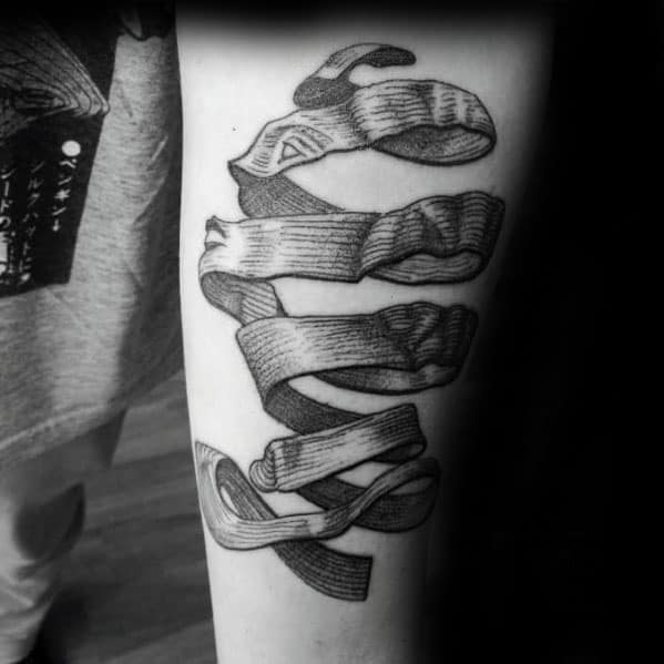 MC Escher-inspired forearm tattoo of a 3D twisted ribbon forming the word “Faith” with woodcut-style shading and illusion.