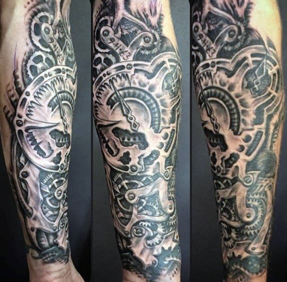 Arm tattoo featuring intricate mechanical gears and clockwork designs in black and grey