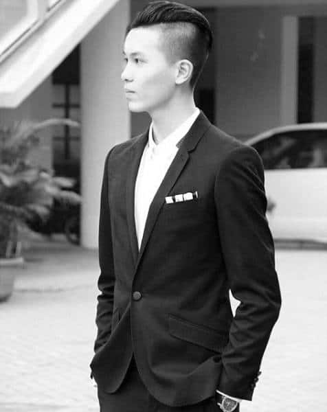 Medium Length Mens Hair Slicked Back With Undercut Sides