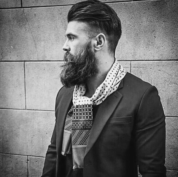 Medium Length Slicked Back Hair For Guys With Side Fade