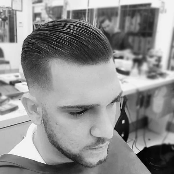 Medium Lenth Slicked Classy Guys Haircuts Comb Over