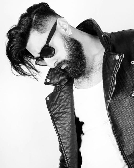 Medium To Long Hairstyle Undercut With Beard For Men