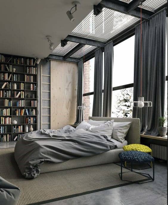 modern apartment bedroom with ceiling to floor bookshelf 