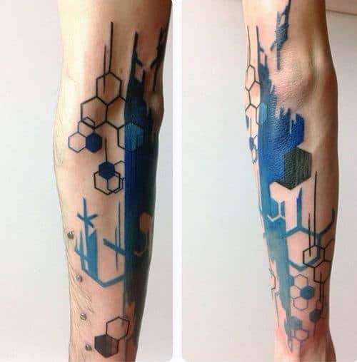 Abstract geometric tattoos with hexagons and blue splashes on forearms