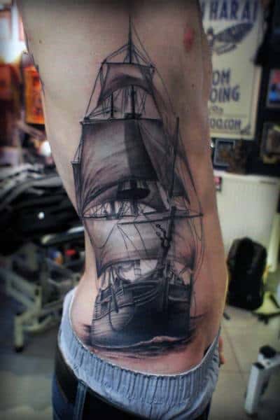 Men Torso Black And Grey Ship Tattoo