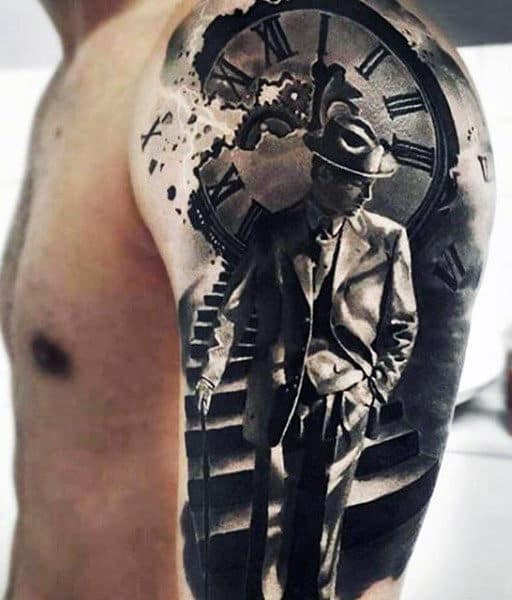 Tattoo of a man in a suit and hat, standing on stairs, with a large clock and Roman numerals in the background