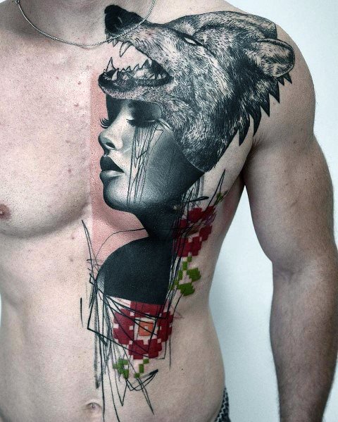 Black and grey chest tattoo featuring a woman's face wearing a wolf headdress, with abstract red and green pixelated elements for a modern artistic design.