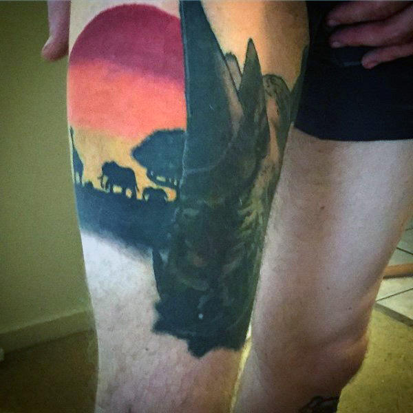Mens African Sunset With Animals Tattoo On Thigh