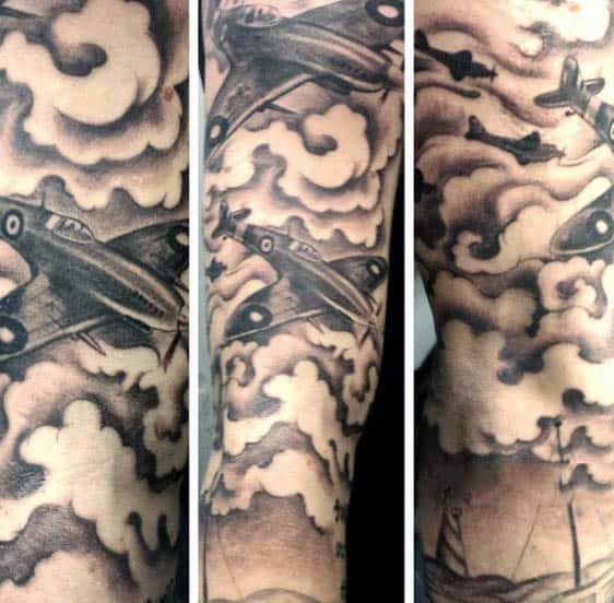 Tattoo of vintage airplanes soaring among clouds in a triptych style.