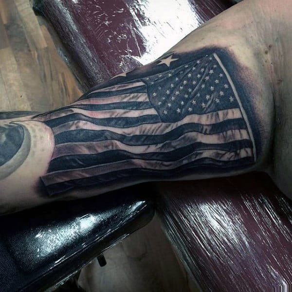 Tattoo of a waving American flag