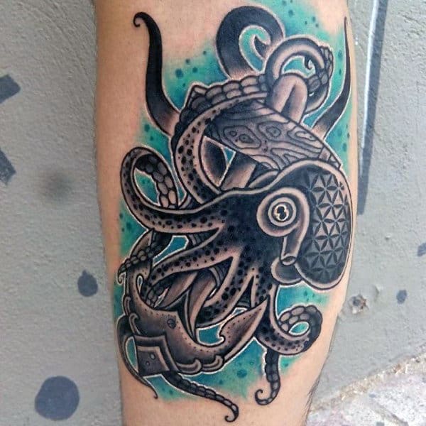 Tattoo of a stylized octopus around an anchor with blue shading on the leg