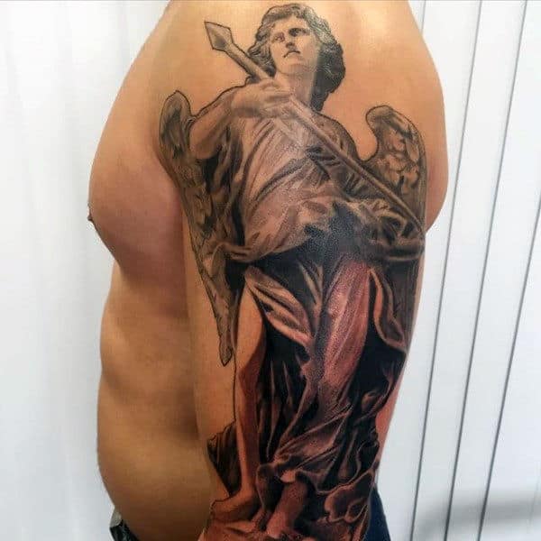 Angel tattoo covering a person's arm and shoulder