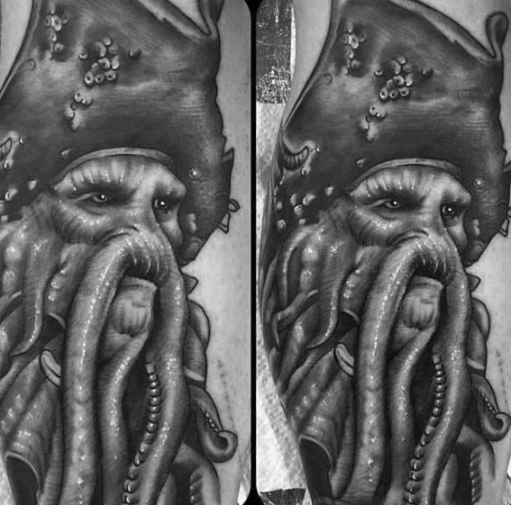 Tattoo of Davy Jones with a tentacle beard in black and gray