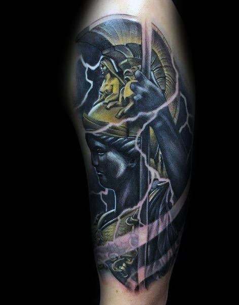 Dramatic Athena tattoo with gold and blue tones, lightning effects, and dynamic pose in a bold, high-contrast color realism style