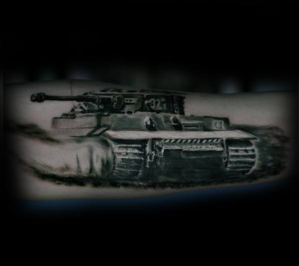 Realistic black and grey tattoo of a WWII tank in motion, kicking up dust with strong shading and dynamic battlefield energy.