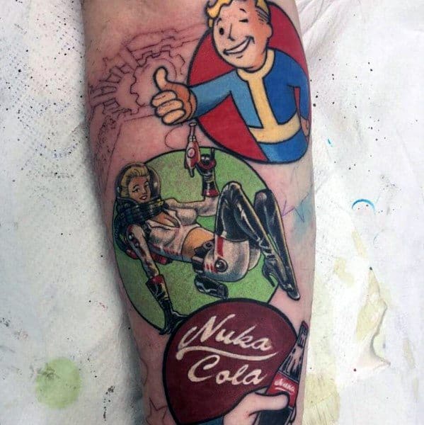 Vault Boy tattoo with a thumbs-up, paired with a pin-up style Nuka-Cola girl and bottle, blending Fallout nostalgia with vintage flair.