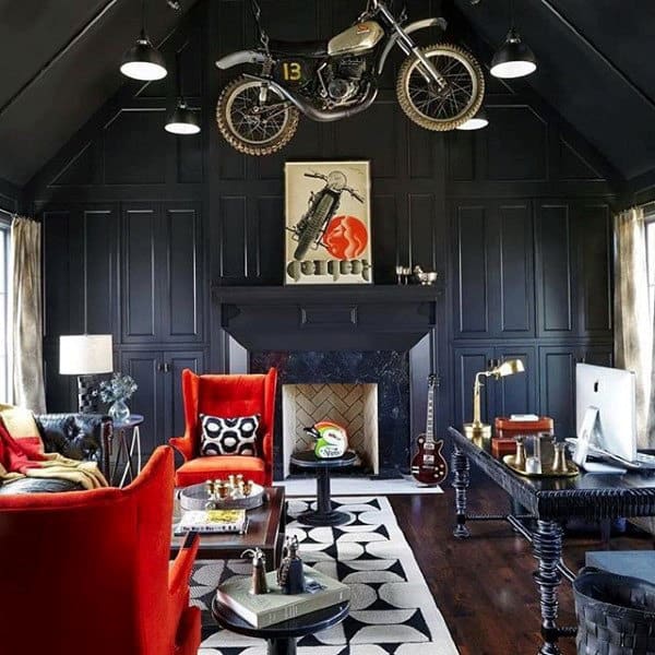 mens den with motorcycle hanging from roof red accent chairs elegant black desk 