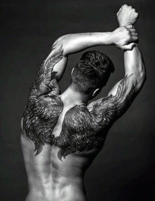 Man with large wing tattoos on his back
