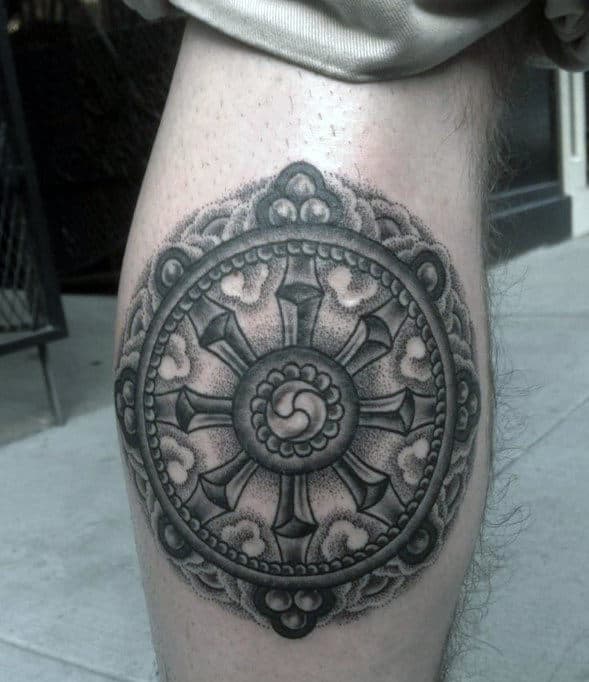 Mens Back Of Leg Calf Shaded Black And Grey Ink Dharma Wheel Tattoo