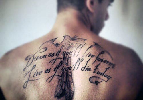 Person with a back tattoo that reads "Dream as if you'll live forever, Live as if you'll die today"