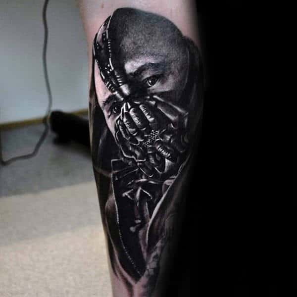 Mens Bane Themed Forearm Tattoo With Dark Shaded Ink Design