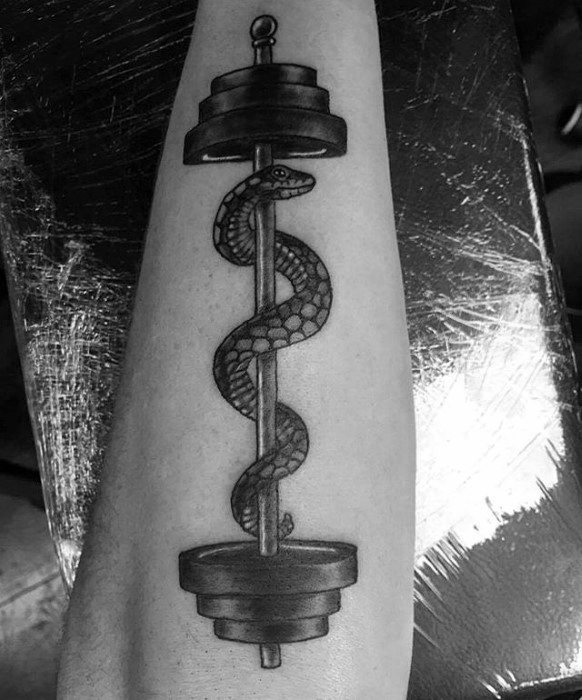 Blackwork tattoo of a snake coiled around a vertical barbell, blending strength and symbolism of transformation, power, and protection.