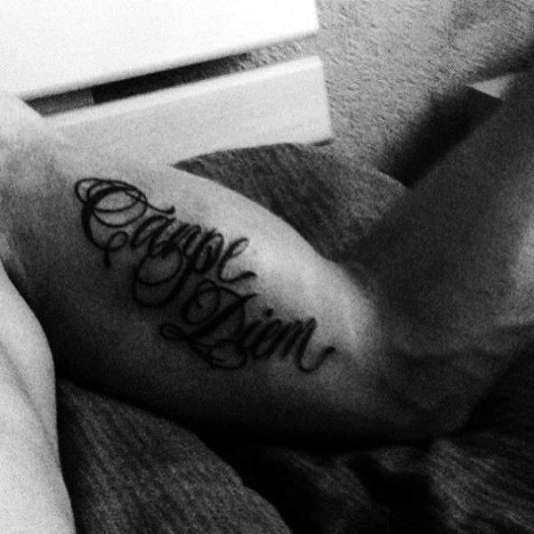 Mens Bicep Carpe Diem Tattoo In Black Ink