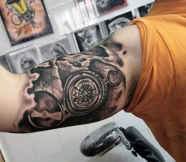 Mens Bicep Map Tattoo In Black Ink