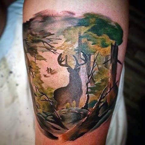 Mens Bicep Tattoo Of Deering Roaming Through The Woods