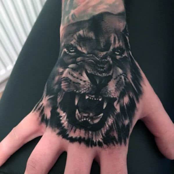Mens Black And Grey Creative Lion Hand Tattoo