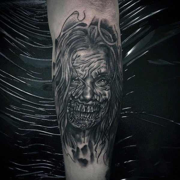 Mens Black Ink Shaded Female Zombie Tattoo On Outer Forearm