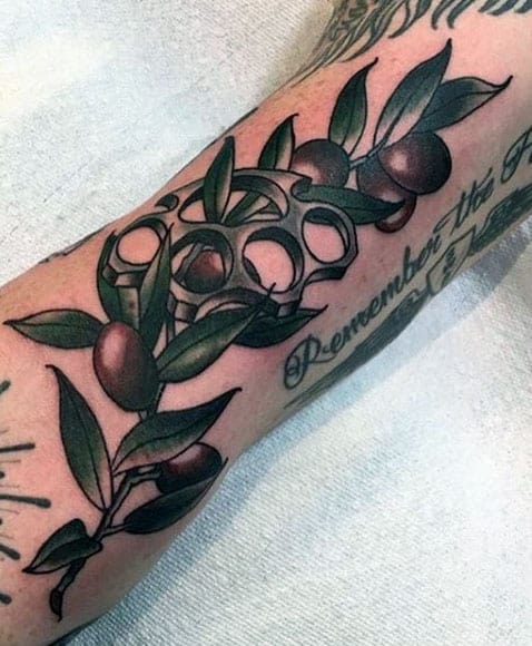 Mens Brass Knuckles Olive Branch Forearm Tattoo