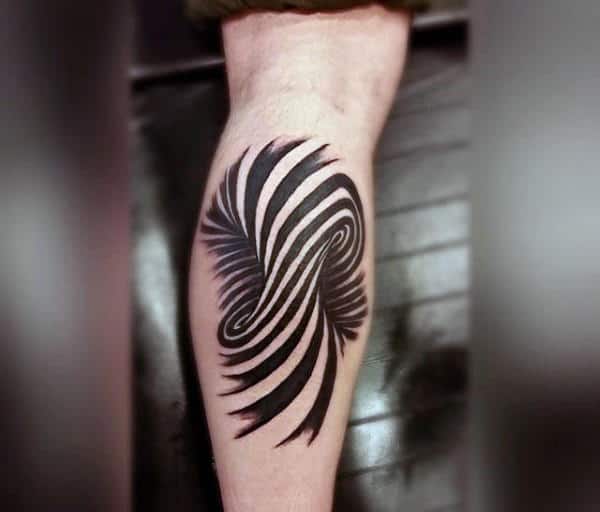 Abstract black ink calf tattoo with swirling, curved lines creating an optical illusion effect for a bold and dynamic design