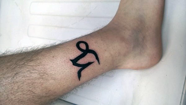 Mens Capricorn Sign Lower Leg Tattoo With Black Ink