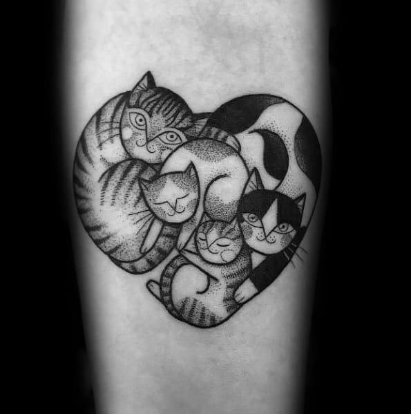Whimsical blackwork tattoo of four cuddled cats forming a heart shape, creating a cozy and loving design.