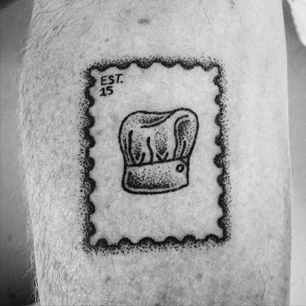 Tattoo of a chef's hat cleverly designed as a vintage postage stamp