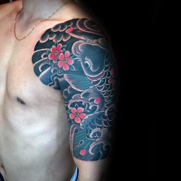 Japanese-style half-sleeve tattoo with bold black ink waves, vibrant red cherry blossoms, and intricate shading for a dynamic design